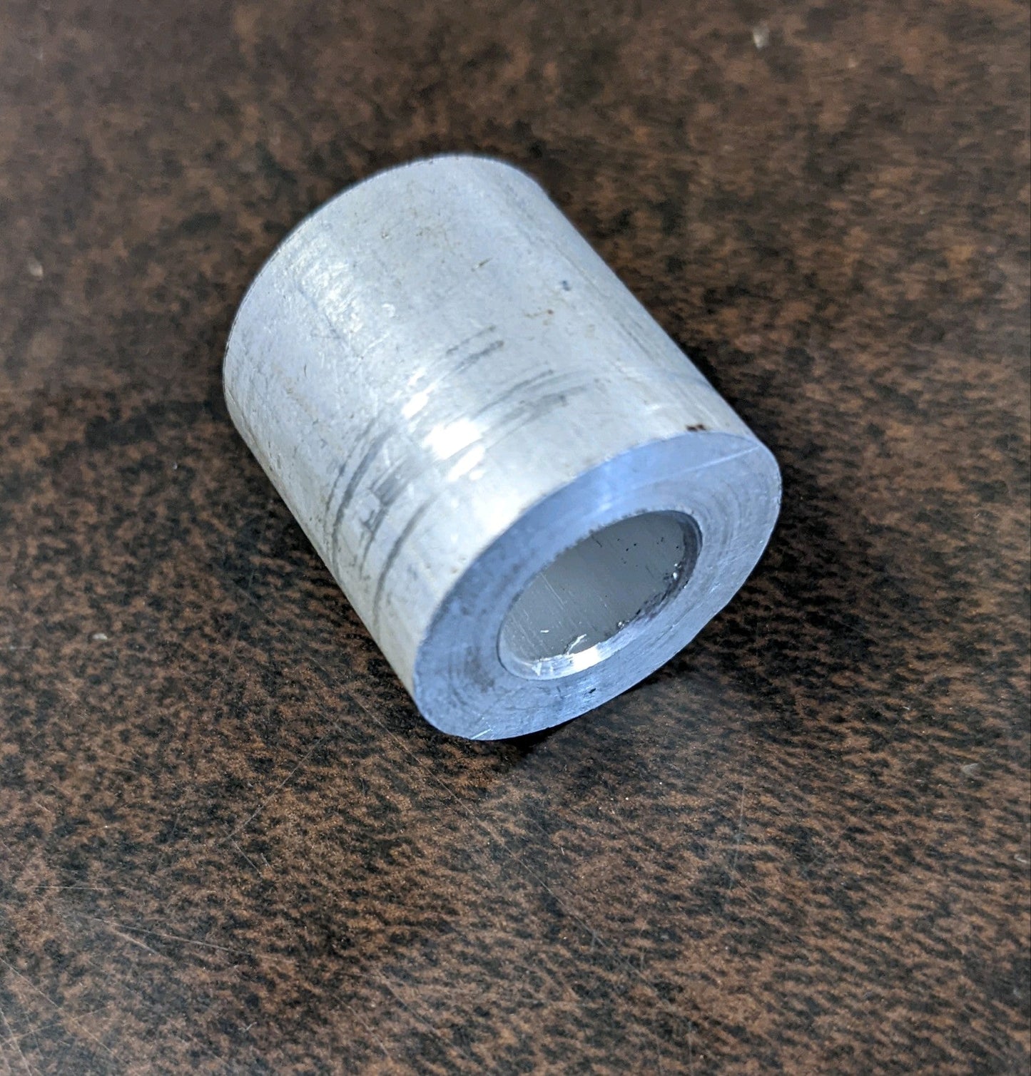 Spacer - 11/16" L x 7/16" ID (7/8"OD) - WISHBONE
